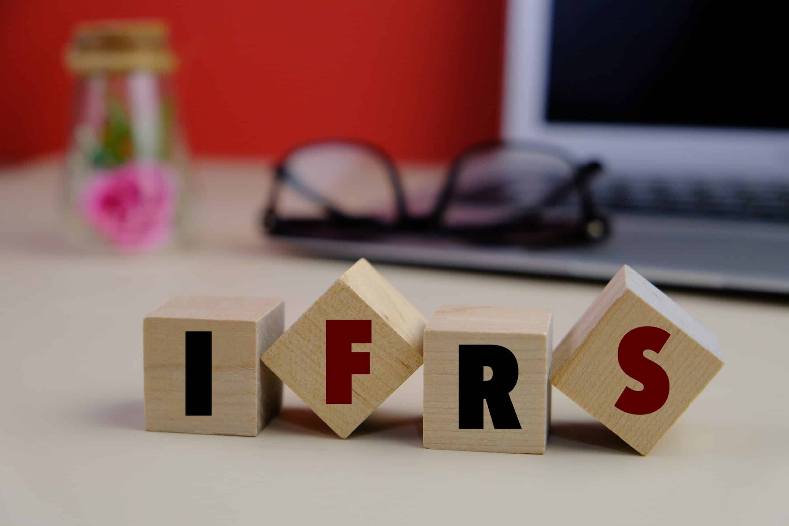 Ifrs,Word,In,Wooden,Blocks,,Laptop,And,Glasses,As,A